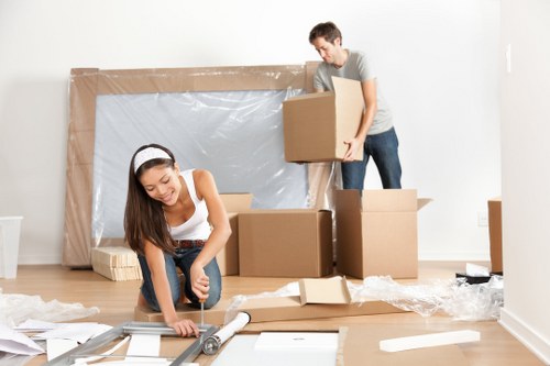 Packing boxes in a Clapham home with careful room-by-room organisation