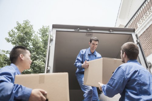 Packed boxes and furniture loaded for transport in Clapham