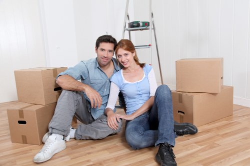 Packed boxes and furniture ready for a house move in Clapham
